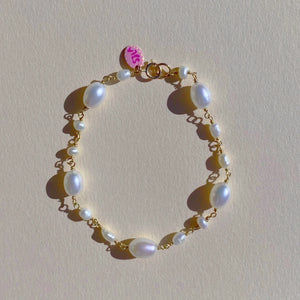 
                  
                    Load image into Gallery viewer, Floating Pearl Bracelet
                  
                